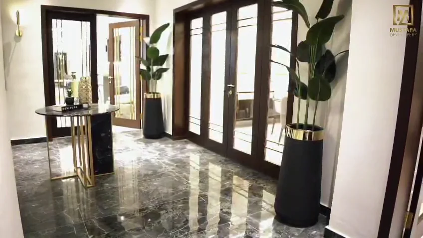 Marble entrance and glazed doors at the E52 residence